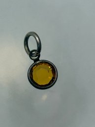 Sterling Silver Pendant With Encased Amber Stone .41 G