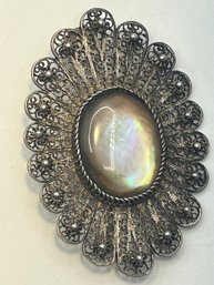Sterling Silver Oval Brooch With Iridescent  Purple Stone With Filigree And Bead Detail. 8.99 G