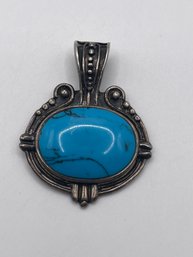 Large Turquoise Oval Stone Pendant In Ornate Sterling Setting 16.04g