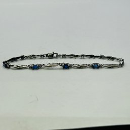 CO Sterling Silver Bracelet With Blue Stones 4.14 G