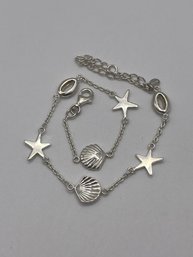 Sterling Bracelet With Starfish And Seashell Charms   5.58g    10'