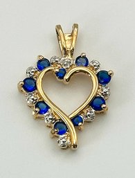 Ornate Gold Toned Heart Pendant With Sapphire Colored Rhinestones 2.15g