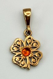 Rose Gold Colored Floral Pendant With Orange Center Stone 1.37g