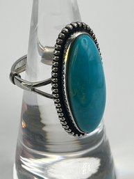 Large Turquoise Sterling Ring 5.13g Size 4 (with Ring Sizer) Size 6.5 (without Ring Sizer)