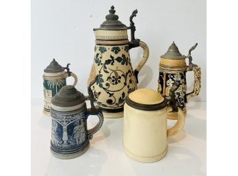 Five Collectible Steins Of Different Sizes