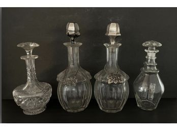 Four Vintage Decanters