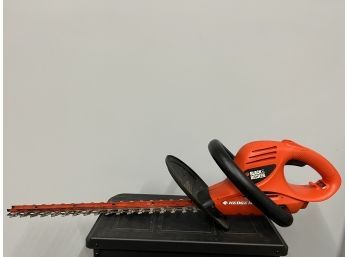 Electric Hedge Trimmer With Sawblade