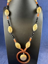 Fall Carved Bead Toggle Clasp Necklace With Black Onyx And Carnelian Pendant, 22'