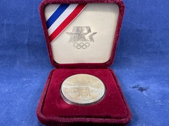 1984-S US Olympic Proof Silver Dollar - In Original Box - 1/2 The Plastic Casing Is Missing