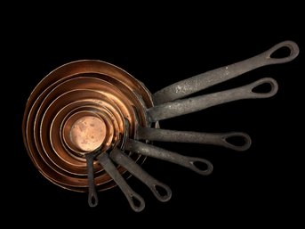 Seven Piece Antique French Copper Saucepans