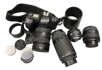 NIKON AF N6006 Camera With Four(4) Lenses And Accessories And Bag