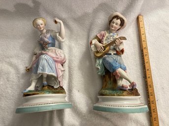 Pair Of Porcelain Figures