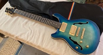 Guitar - Left Handed Hollow Body Electric Guitar By Aria In Mint Condition With Soft Case.