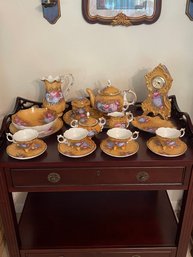 Twenty Two Piece Hand Painted China Tea Set With Matching Clock