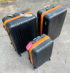 Four Piece Hard Luggage Set On Roller Wheels