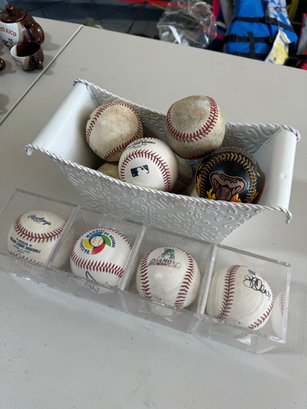 Signed And Unsigned Baseballs With And Without Cases