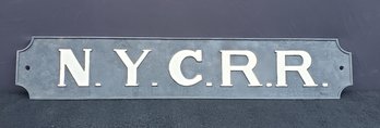 Cast Iron NYC RR Sign