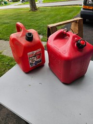 Pair Of Red Gas Cans