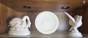 Three Ceramic Figurines Seen Here