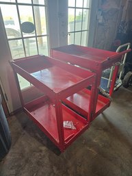 Pair Of Red Shop Carts