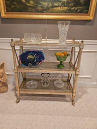 Bar Cart And Its Decorative Glass Contents