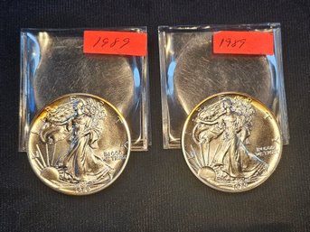 Two 1989 Silver Dollars In Plastic Sleeve