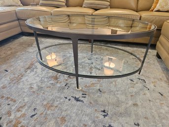 Gorgeous Oval Shaped Two Tier Glass And Steel Table