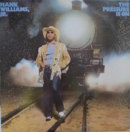 1981 RELEASE HANK WILLIAMS JR- HANK WILLIAMS JR'S THE PRESSURE IS ON VINYL RECORD SE-535 ELEKTRA RECORDS