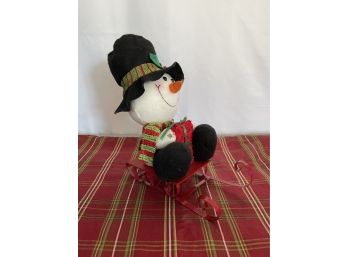 Stuffed Snowman On A Sleigh