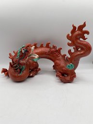 A 19TH CENTURY CHINESE PORCELAIN FIGURE OF A DRAGON