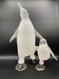 LOT OF 2 GLASS AND PLASTIC PENGUINS SKATING-APPROX. 16' AND 8'