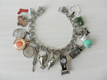 Sterling Silver Charm Bracelet With Some Charms Sterling   (D56)