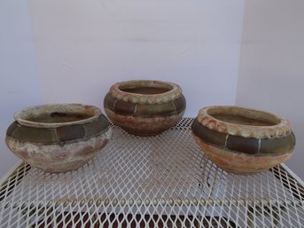 Three Matching Terra Cotta Planters