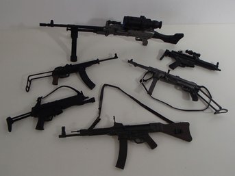 Six Action Figure Toy Guns