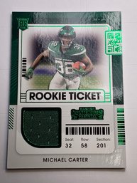 2021 PANINI CONTENDERS ROOKIE TICKET RTS-MCA MICHAEL CARTER AUTHENTIC GAME WORN JERSEY ROOKIE CARD GREEN FOIL
