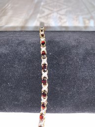 Gold Over Sterling Garnet Tennis Bracelet