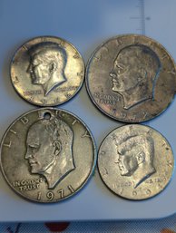 4 Coins: Eisenhower Dollar 1972, Eisenhower Dollar W/ Rivet Punch, 1966 And 1994 Kennedy Half