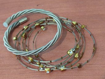 7 Silvertone Wire Bracelets