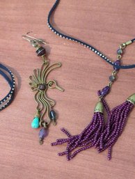 One Long Native Style Bird Earring With Natural Stones And Leather Corded Dangling Necklace With Purple Beads