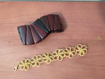 Two Vintage Bracelets- 1 Polished Wood, One Gold Metal Flowers