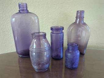 Antique Sun Purple Glass Bottles Including Two Shoulder Bottles,  Tall Cylinder, Ink Bottle And Mustard Pot