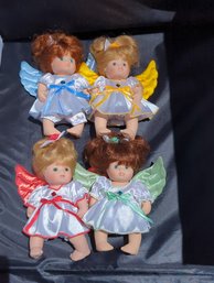 4 Small Angel Porcelain Dolls With Jointed Limbs  - 7 Inches Tall