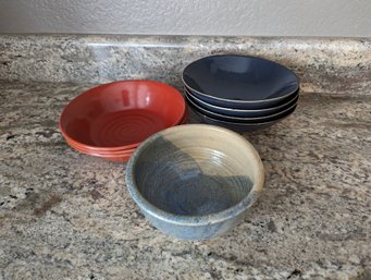 8 Pc Various Bowls - 3 Orange Melamine Bowls 7', 4 Stoneware Bowls 6', One Handmade Pottery Bowl 6'