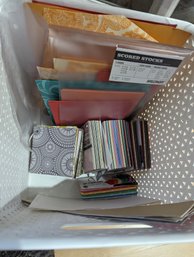 Bin Of Small Papercraft Items Including Blocks Of Paper Samples