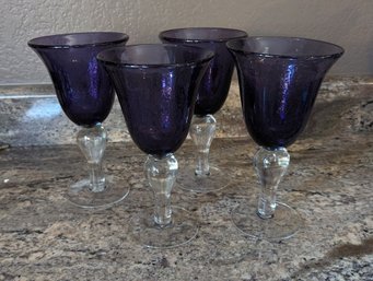 Four Large Purple Blown Glass Goblets