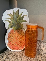 Festive Pineapple Tray And Orange Glass Pitcher With Lid Approximately 10 Inches