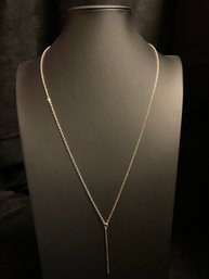 Silver Tone Necklace With Cylindrical Pendant