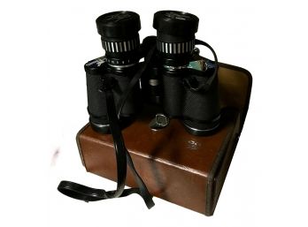 Pair Of Binoculars In Leather Case