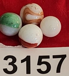 Vintage Lot Of 4 Marbles Various Colors On White Base