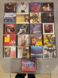 21 CD Lot Stevie Ray Vaughn, Louis Armstrong, Miles Davis, Eric Clapton, Charles Mingus, Ella Fitzgerald,